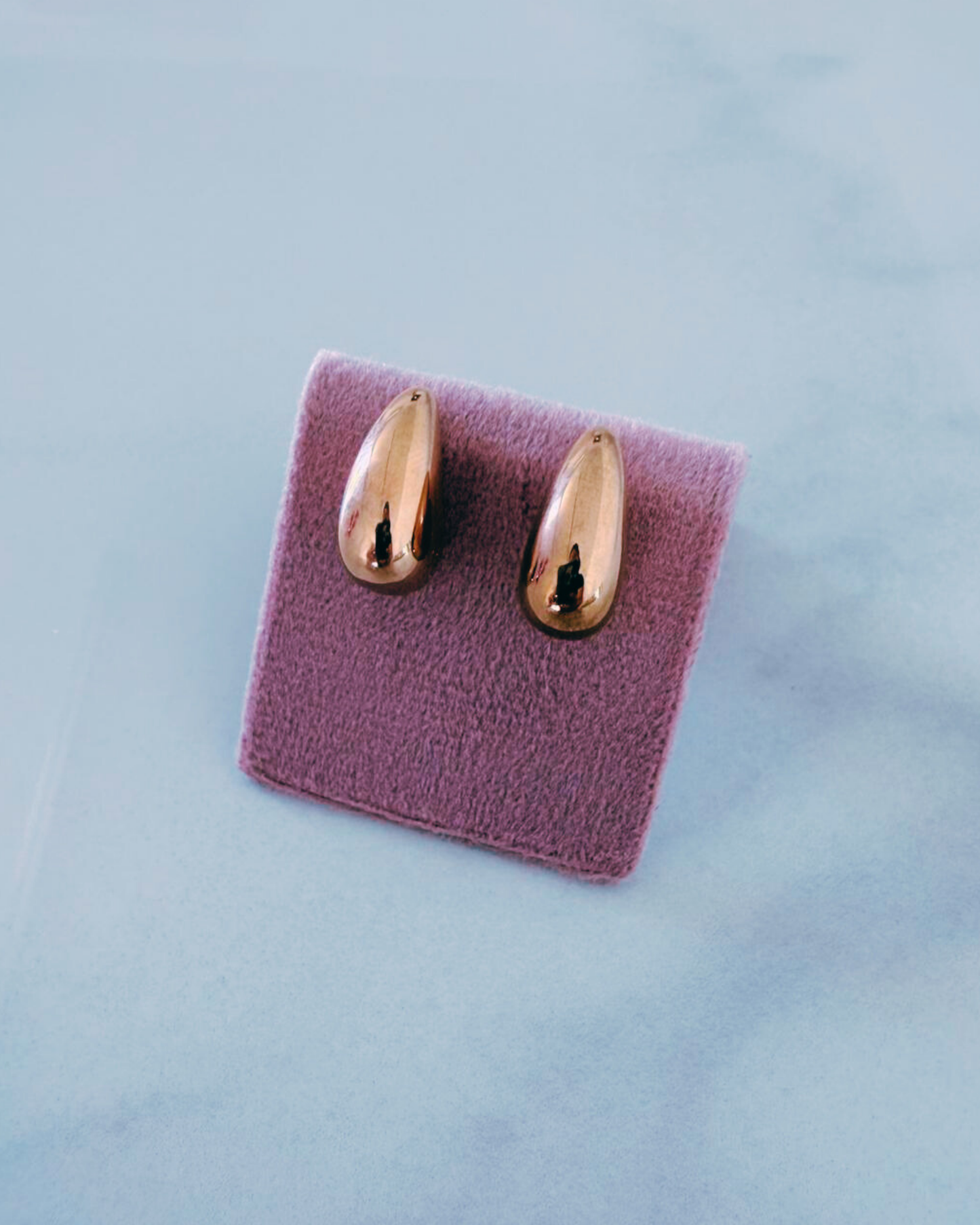 Gold studs earrings